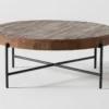 Dunkin 38" Round Coffee Table -Furniture Store 254051 brown wood coffee table signature 01