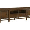Macarthur 81" Tv Stand 1 Macarthur 81" Tv Stand -Furniture Store 306160 brown wood media console signature 01