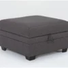 Solimar Graphite Storage Ottoman -Furniture Store 316326 grey fabric ottoman signature 01